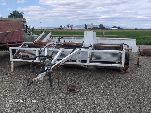 picture of a mechanical non selective asparagus harvester or asparagus picker